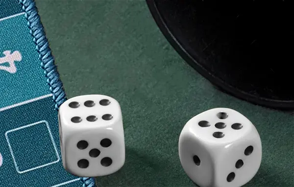 A picture of the gamemat with some dice