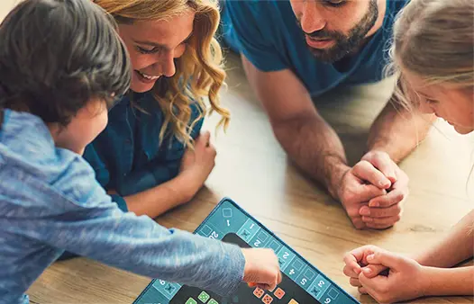 A picture of the gamemat being used by a family